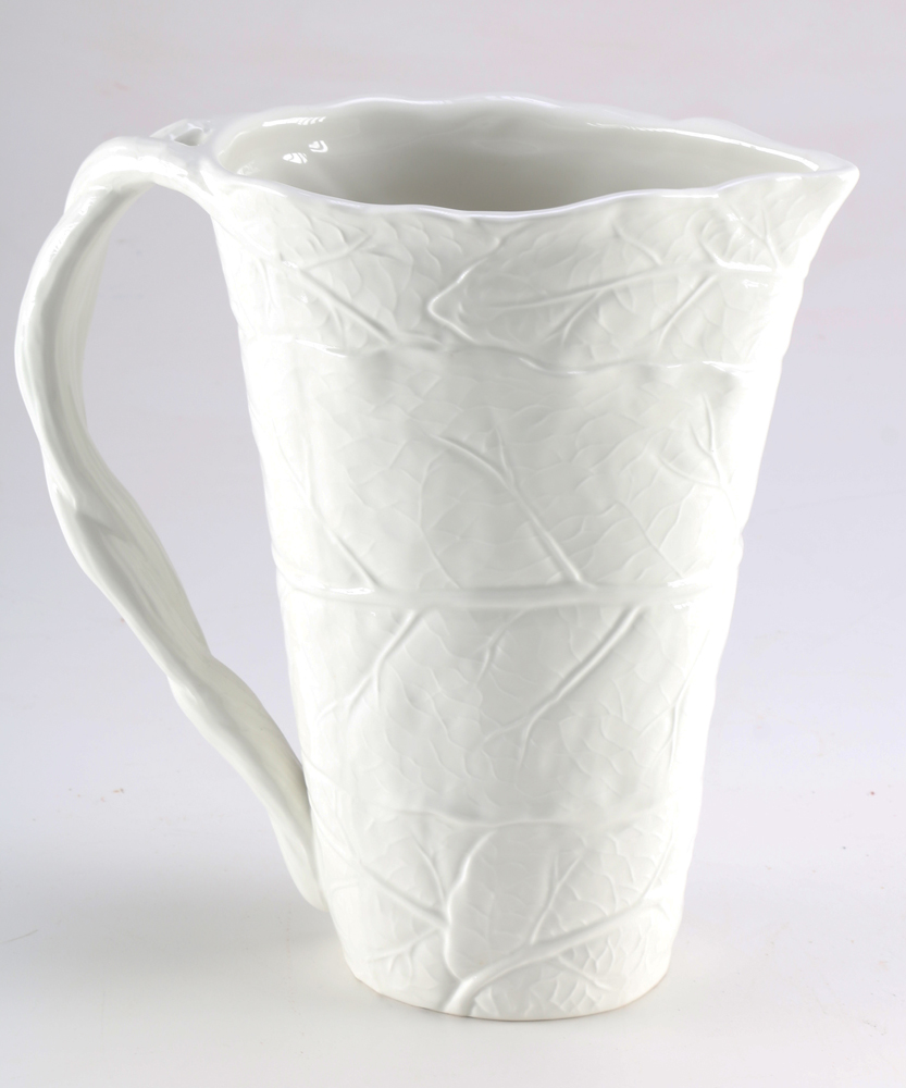 Four Ceramic Pitchers