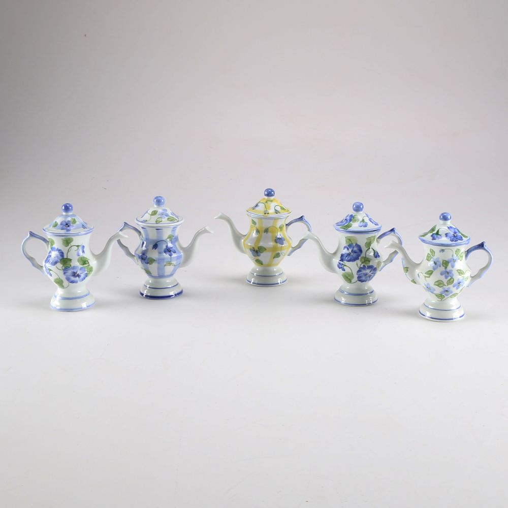 Five Teapot Candle Holders