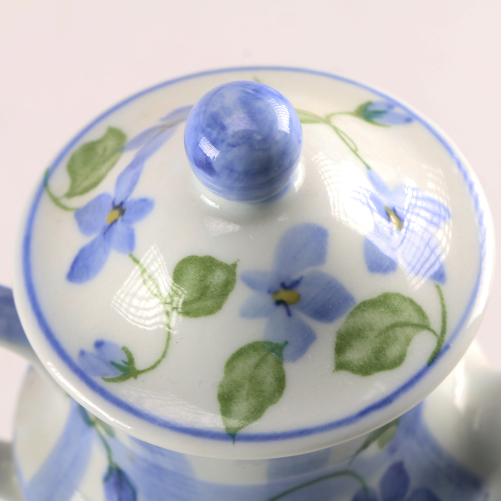 Five Teapot Candle Holders