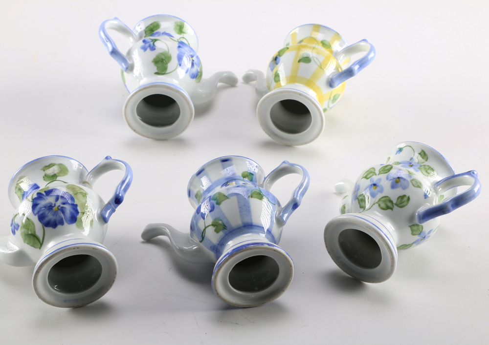 Five Teapot Candle Holders