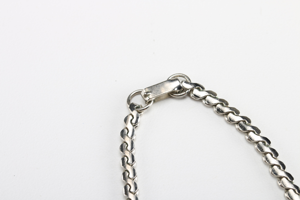 Assortment of Silver Tone Earrings and Necklace