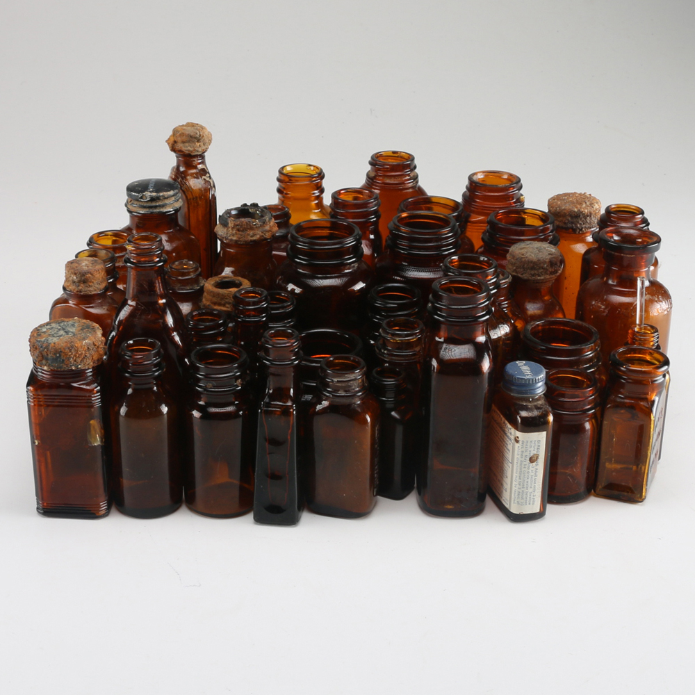 Collection of Vintage Amber Glass Apothecary Bottles