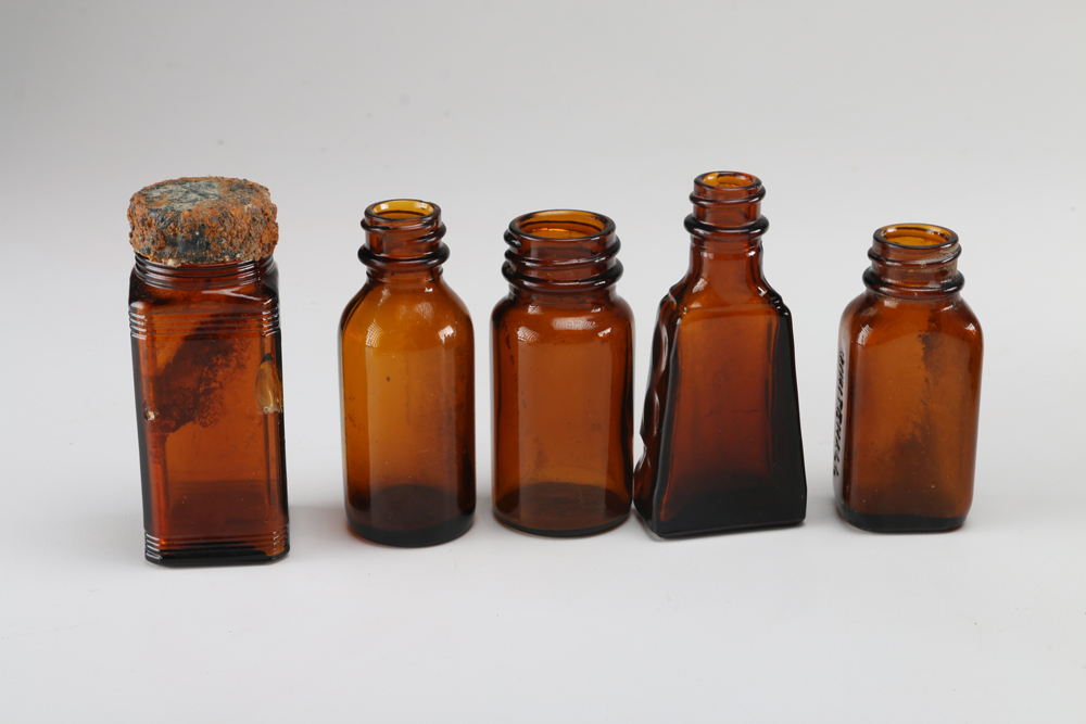 Collection of Vintage Amber Glass Apothecary Bottles