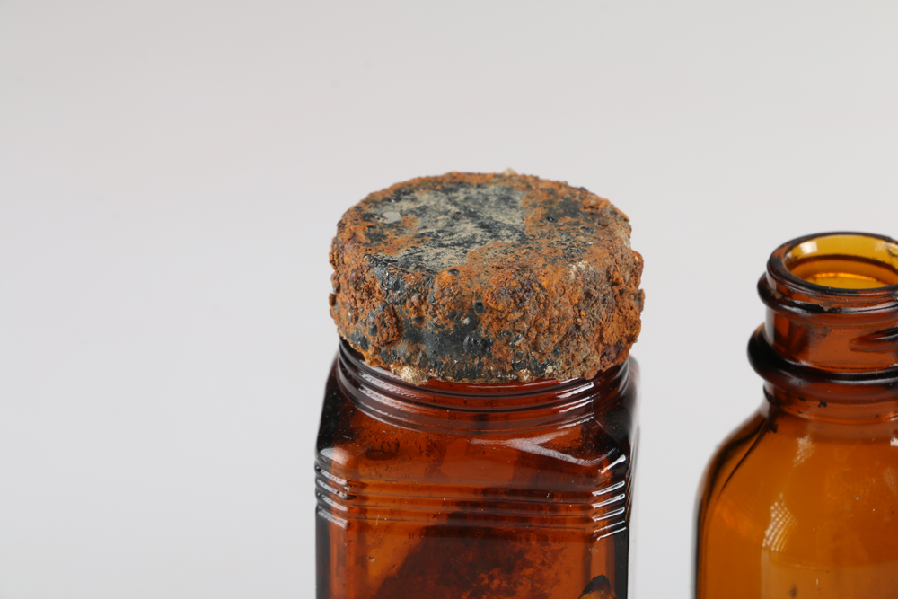 Collection of Vintage Amber Glass Apothecary Bottles