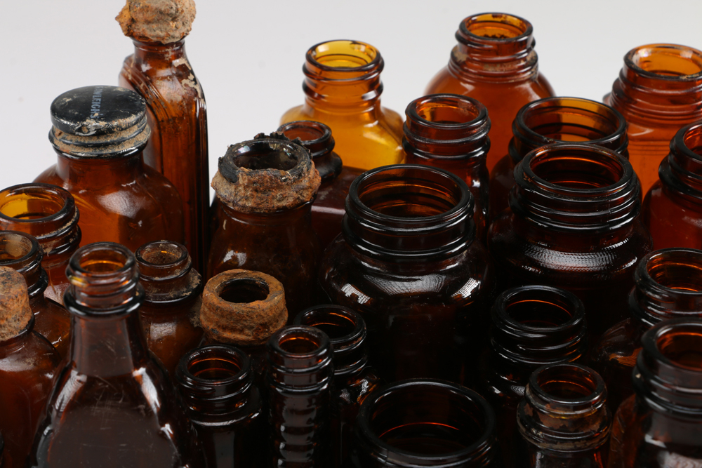 Collection of Vintage Amber Glass Apothecary Bottles