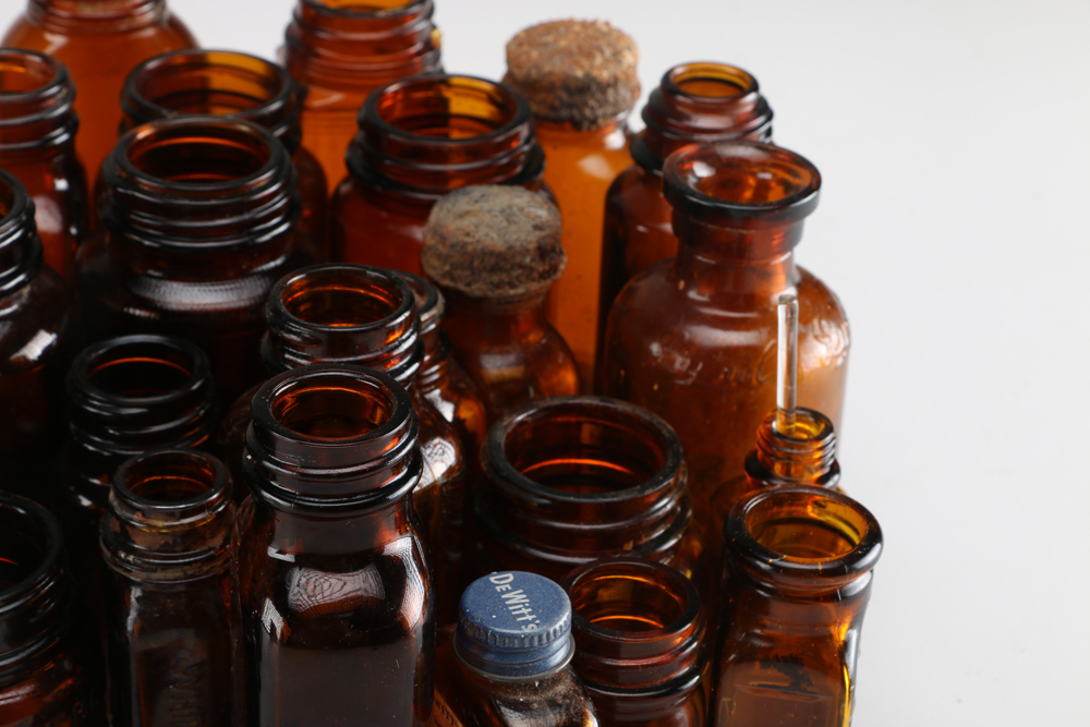 Collection of Vintage Amber Glass Apothecary Bottles
