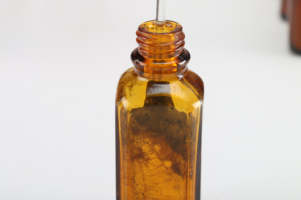 Collection of Vintage Amber Glass Apothecary Bottles