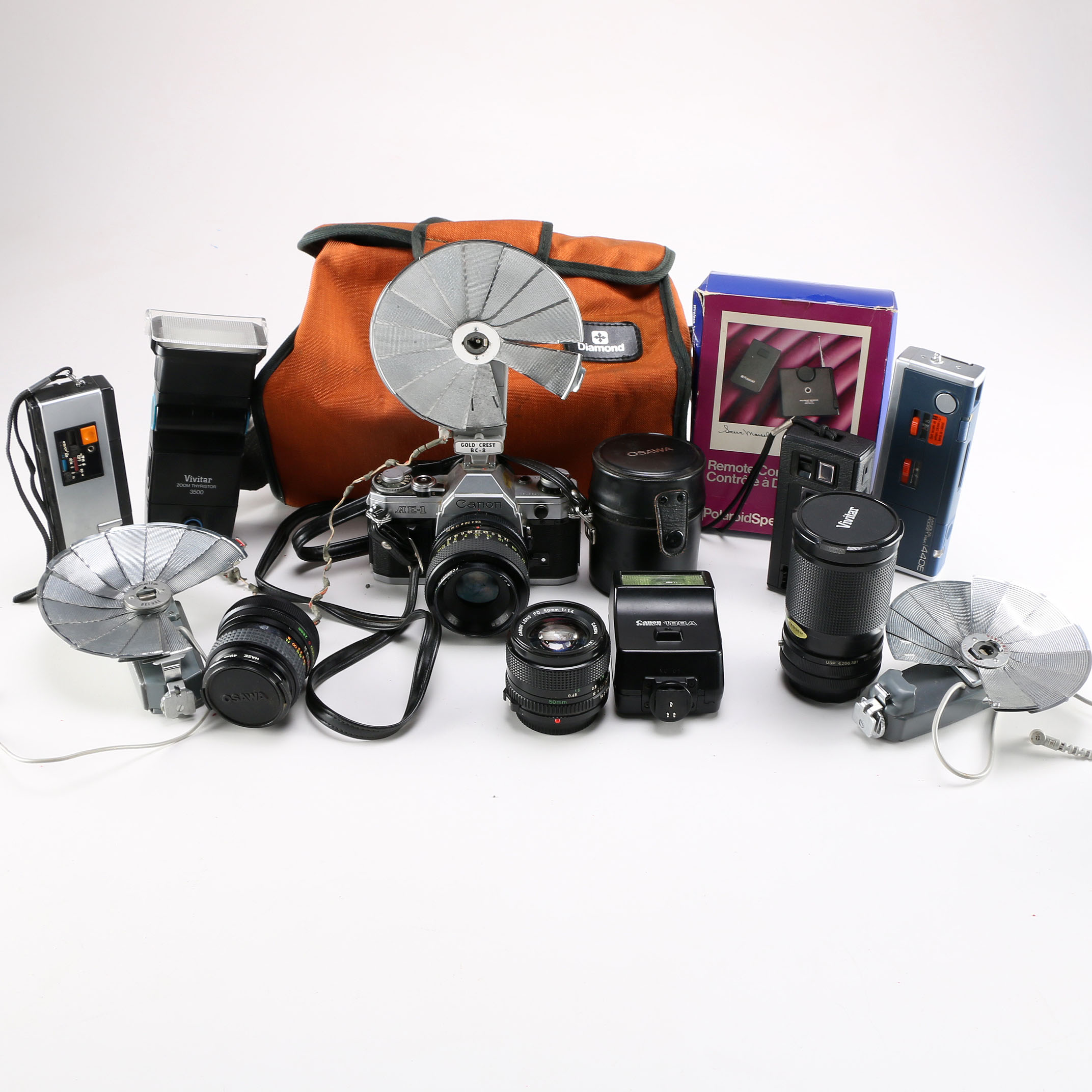 Eighteen-Piece Collection of Cameras and Accessories