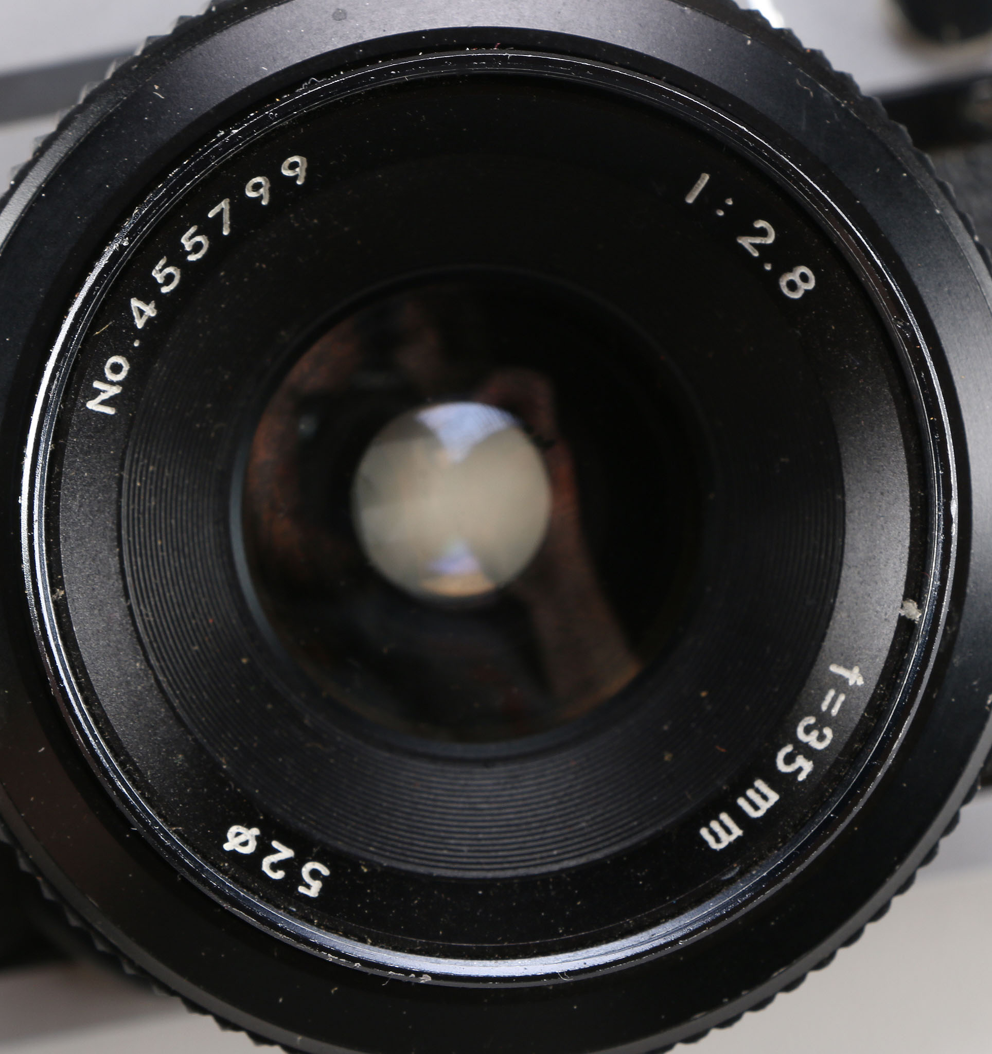 Eighteen-Piece Collection of Cameras and Accessories