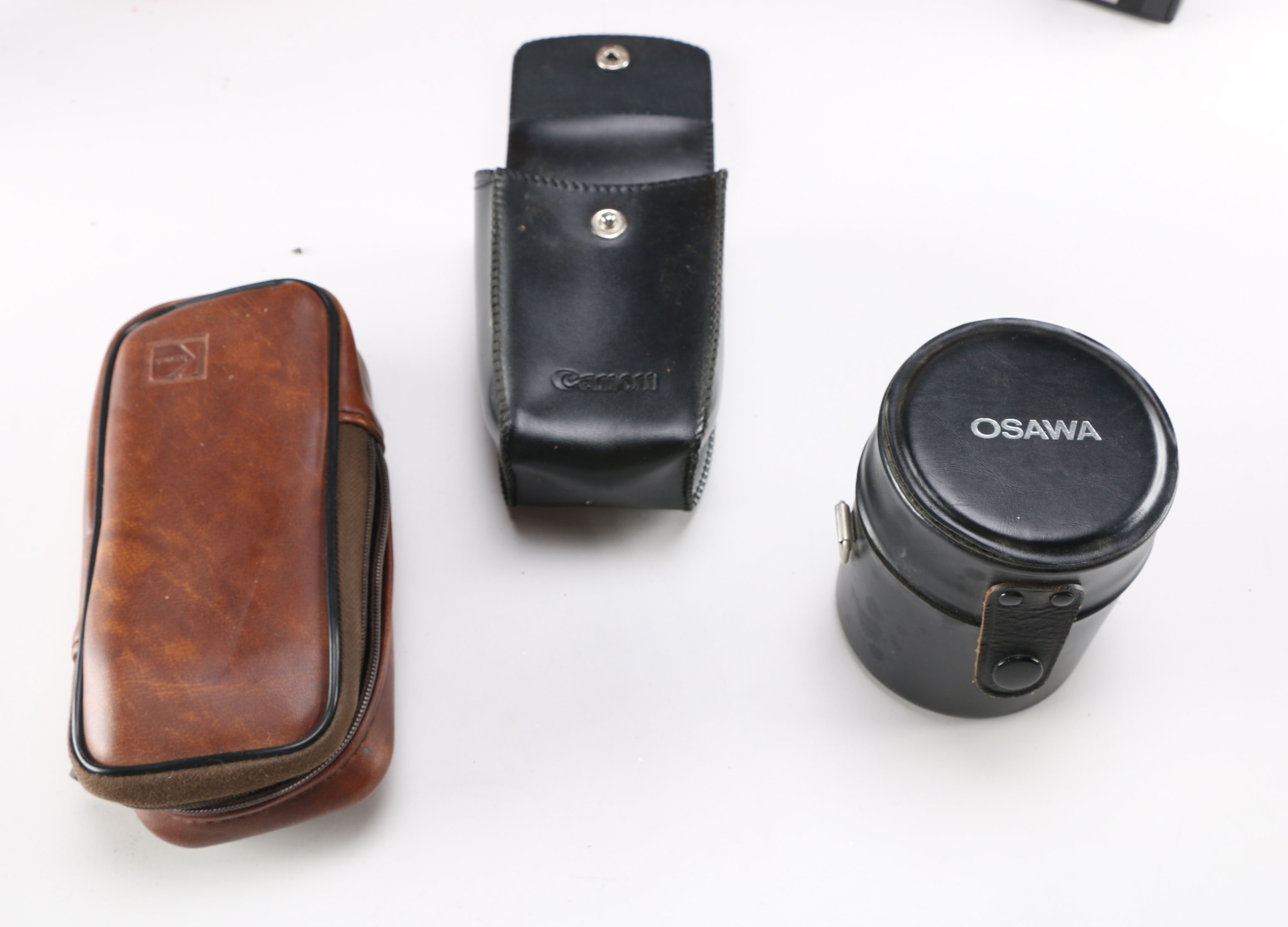 Eighteen-Piece Collection of Cameras and Accessories