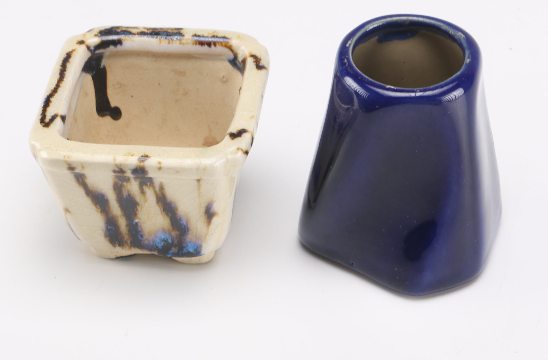 Assortment of Ceramic Bowls and Vases