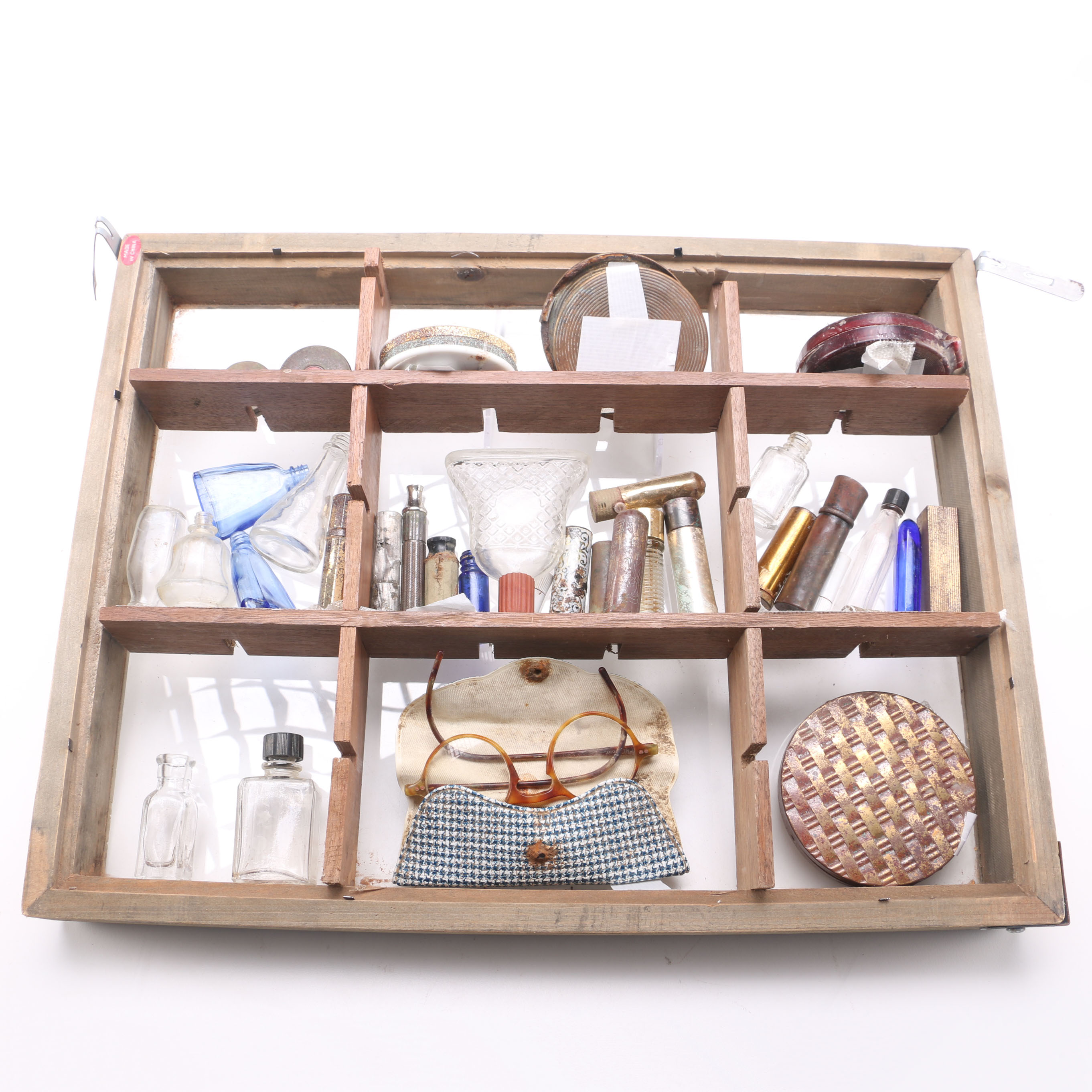 Decorative Shelf with Antiqued Apothecary Bottles, Cosmetic Containers, and More