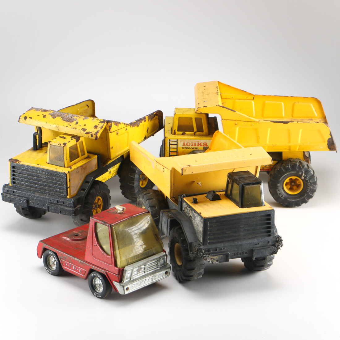 Assortment of Four Tonka Trucks