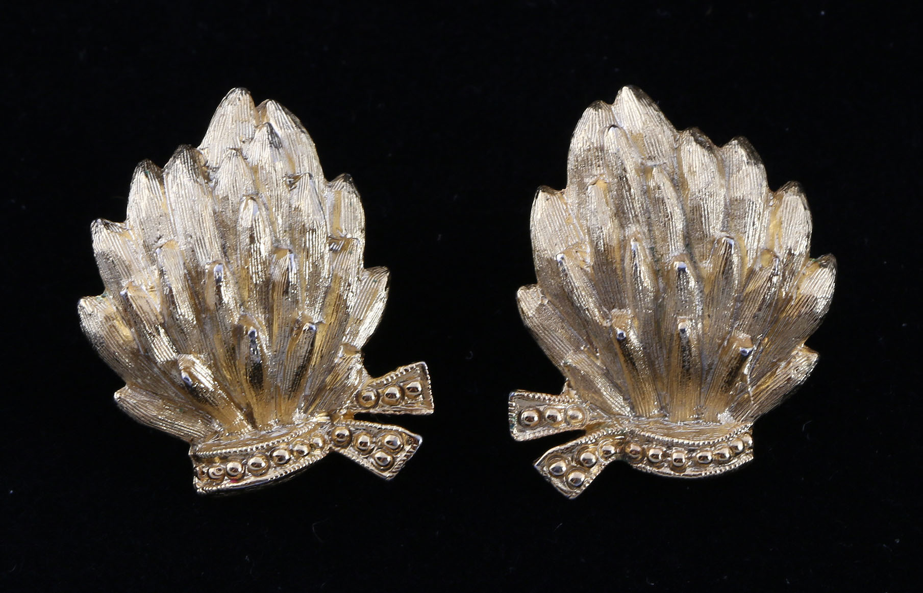 Collection of Black, White, and Gold Tone Jewelry