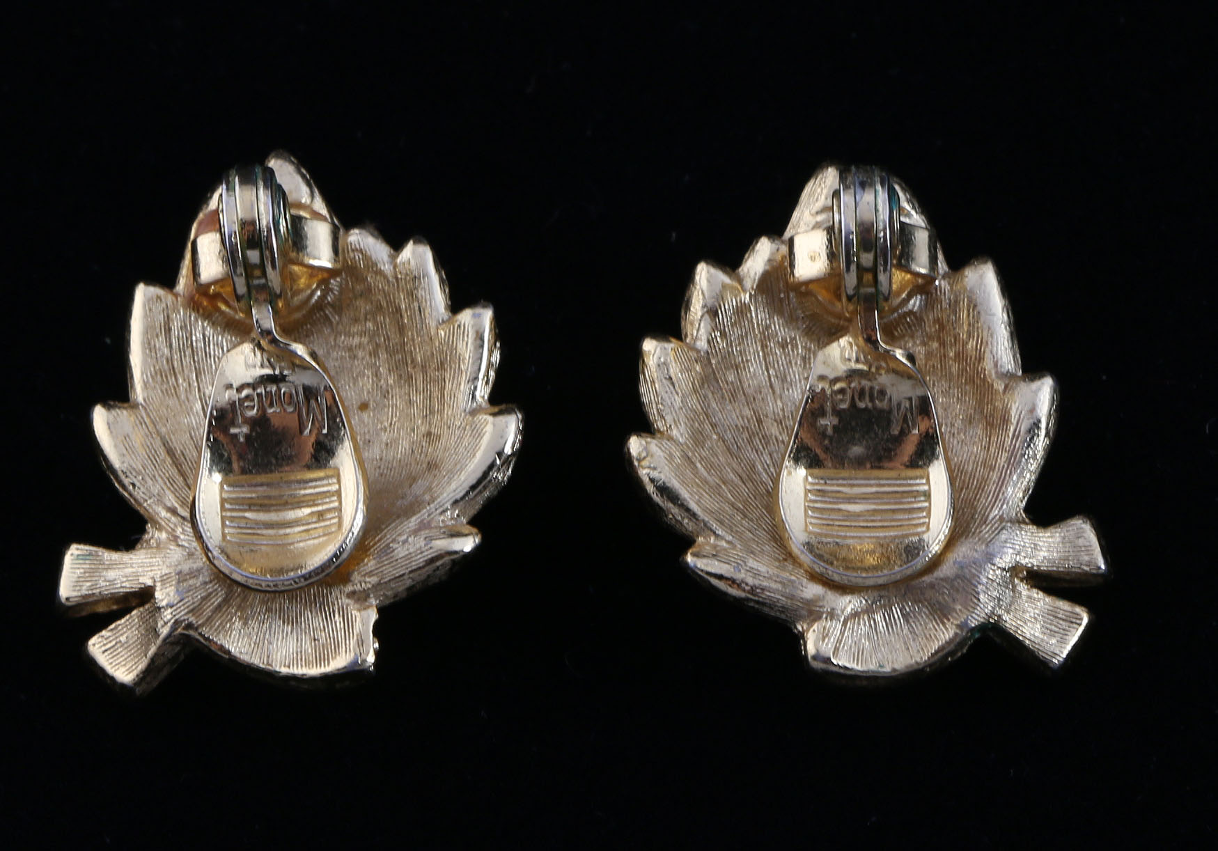 Collection of Black, White, and Gold Tone Jewelry