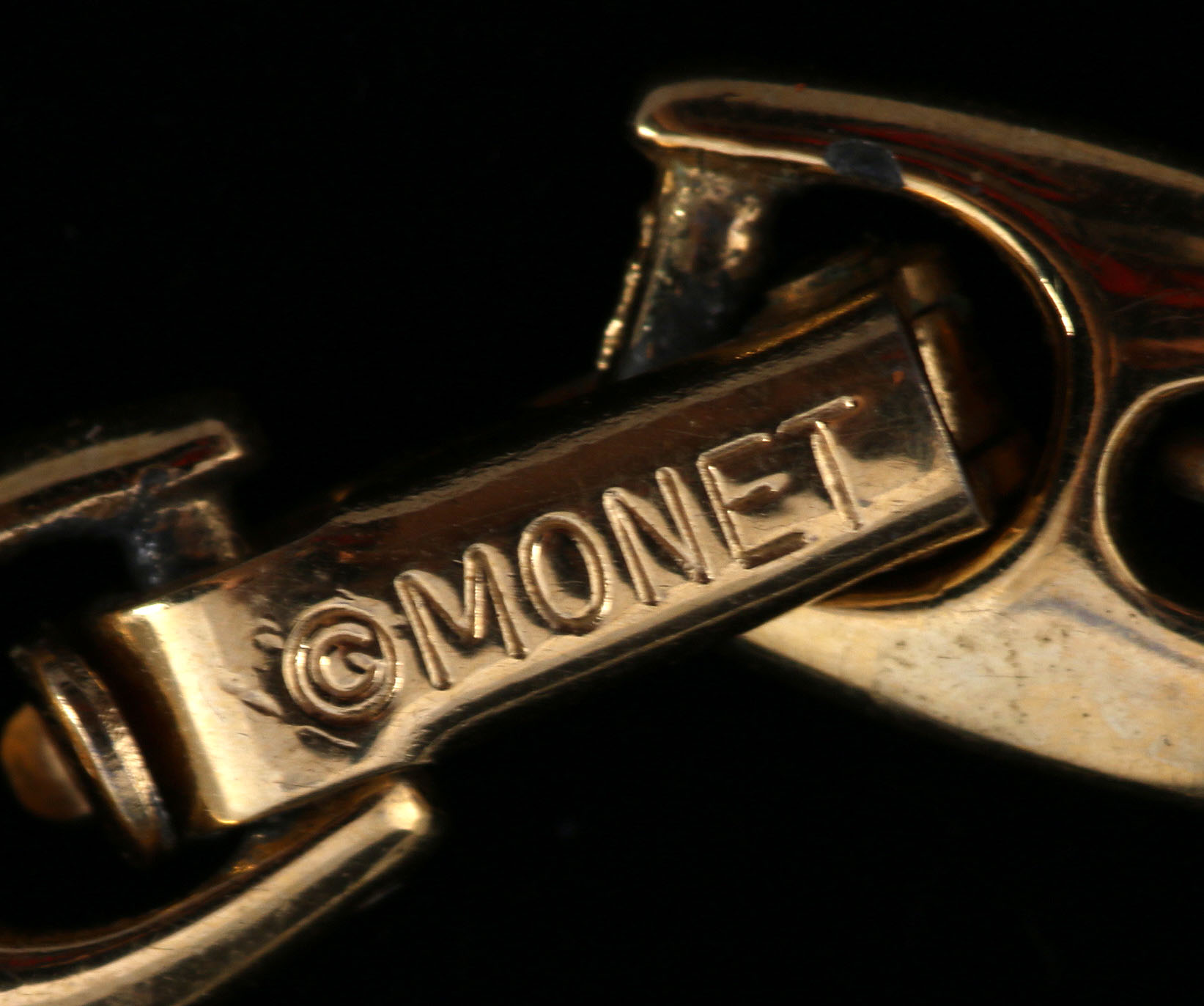 Collection of Black, White, and Gold Tone Jewelry