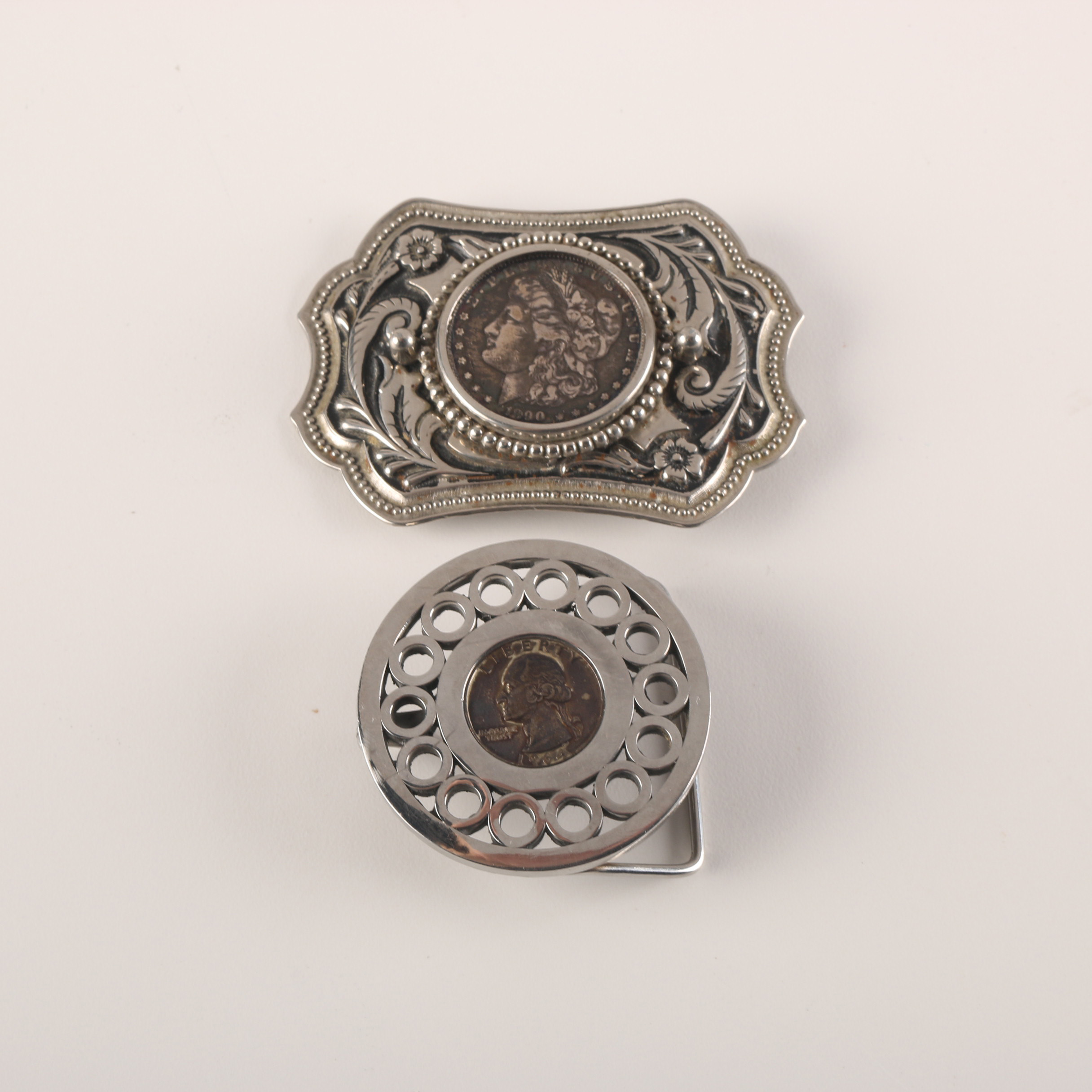 Pair of Coin Inlaid Belt Buckles