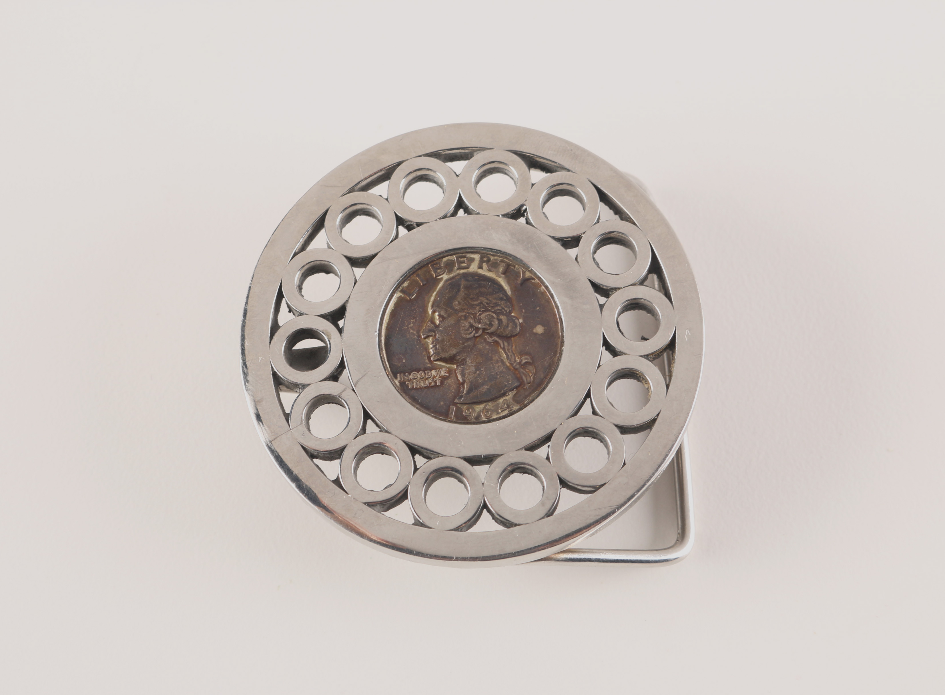 Pair of Coin Inlaid Belt Buckles