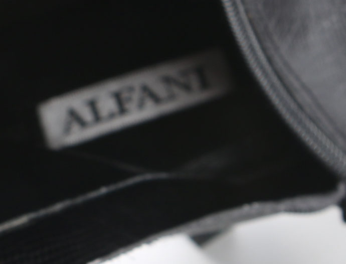 Pair of Alfani Leather Boots