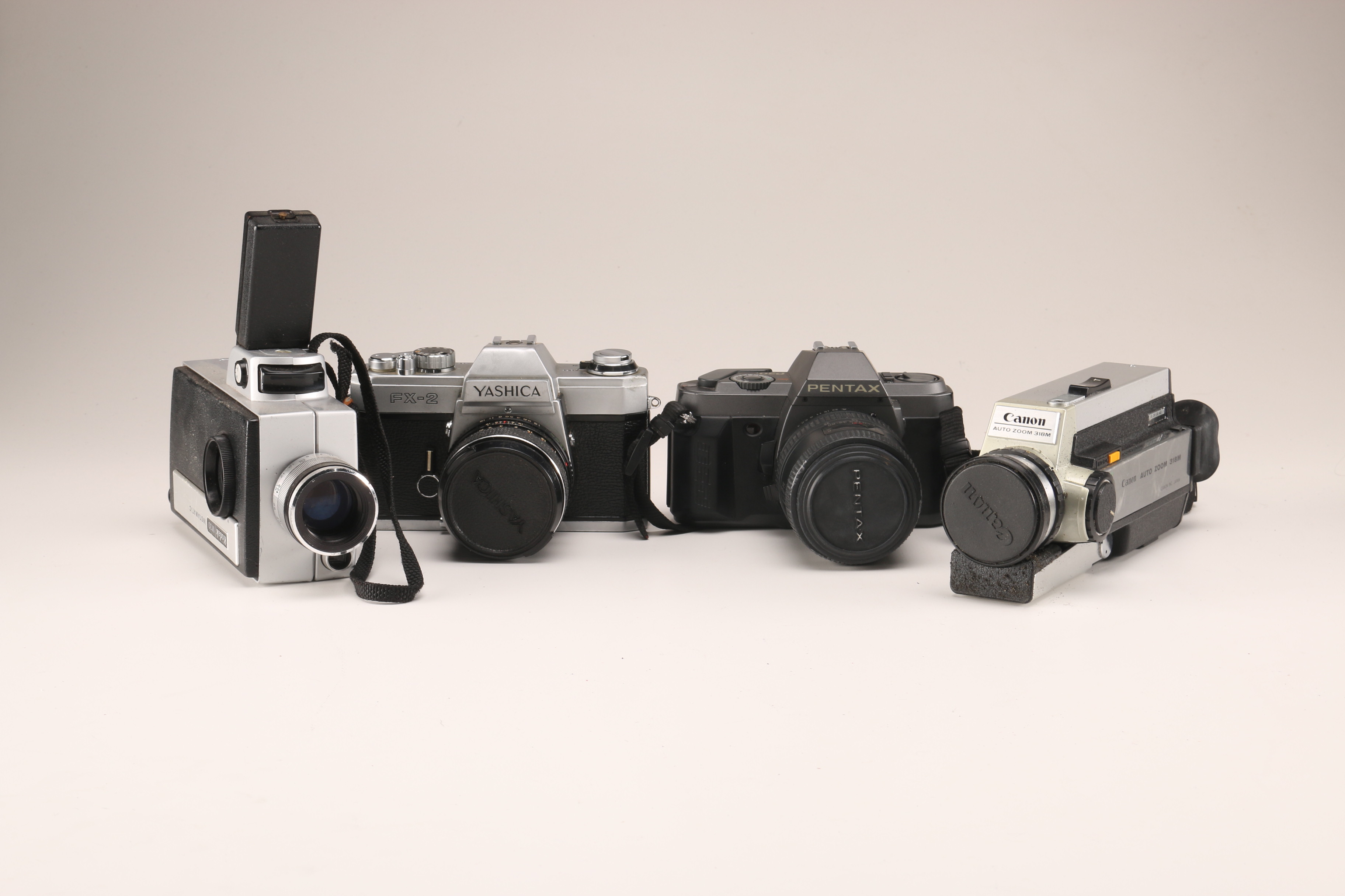 Collection of Vintage Cameras and Accessories