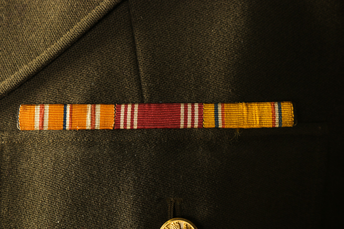 Pair of Military Uniforms and Medals