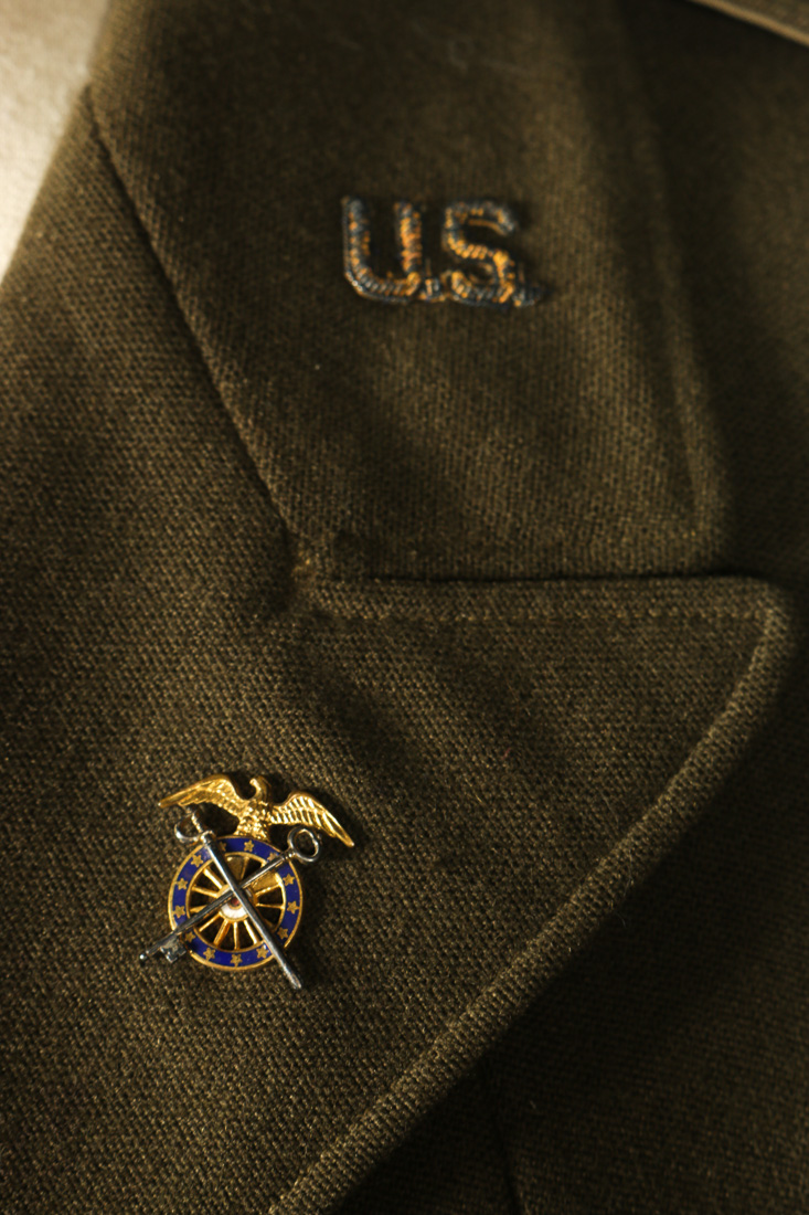 Pair of Military Uniforms and Medals