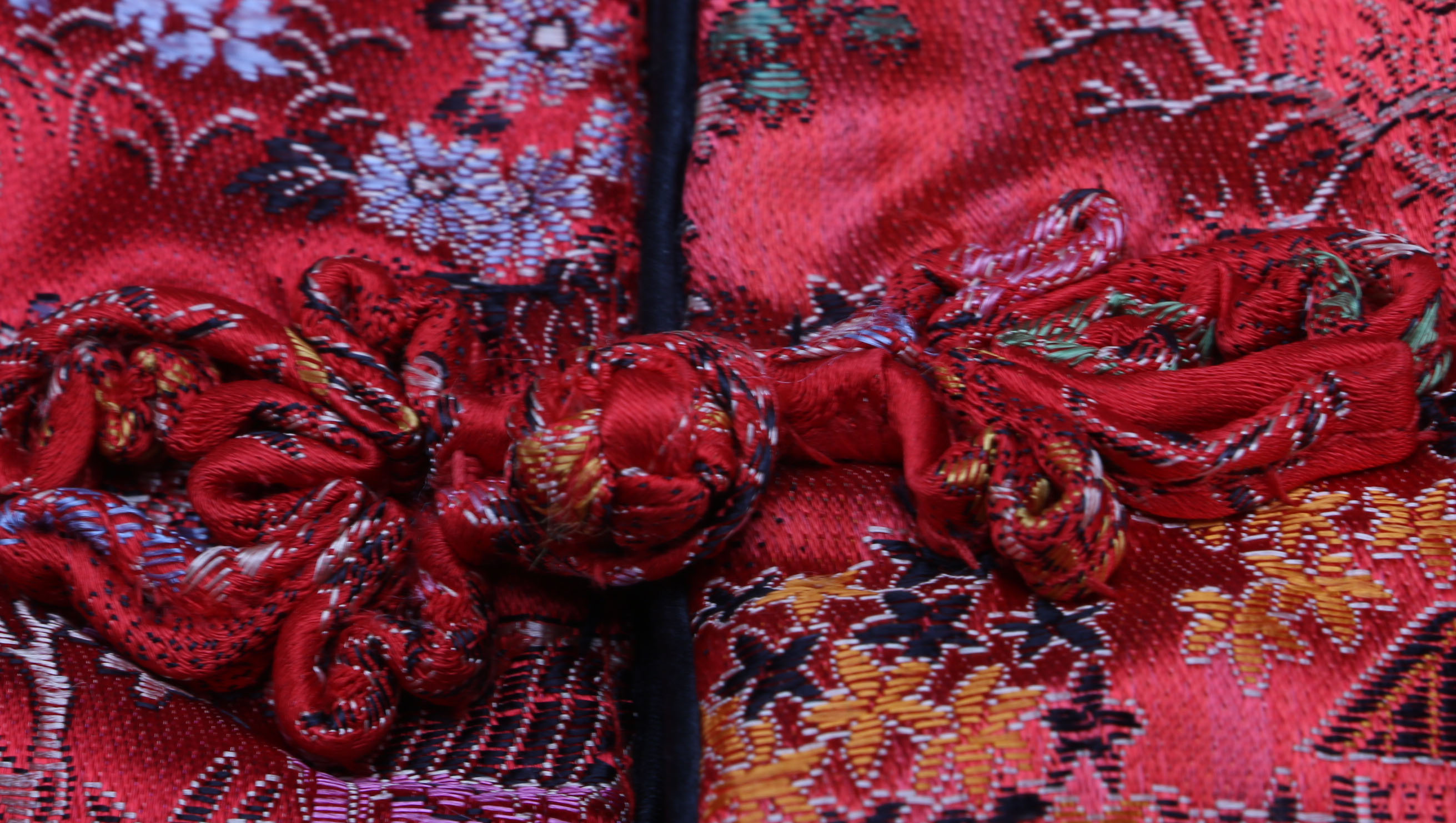Two Red Embroidered Silk Chinese Jackets