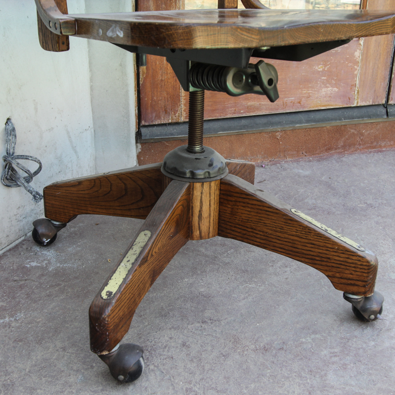 Vintage Rolling Chair with Cane Back