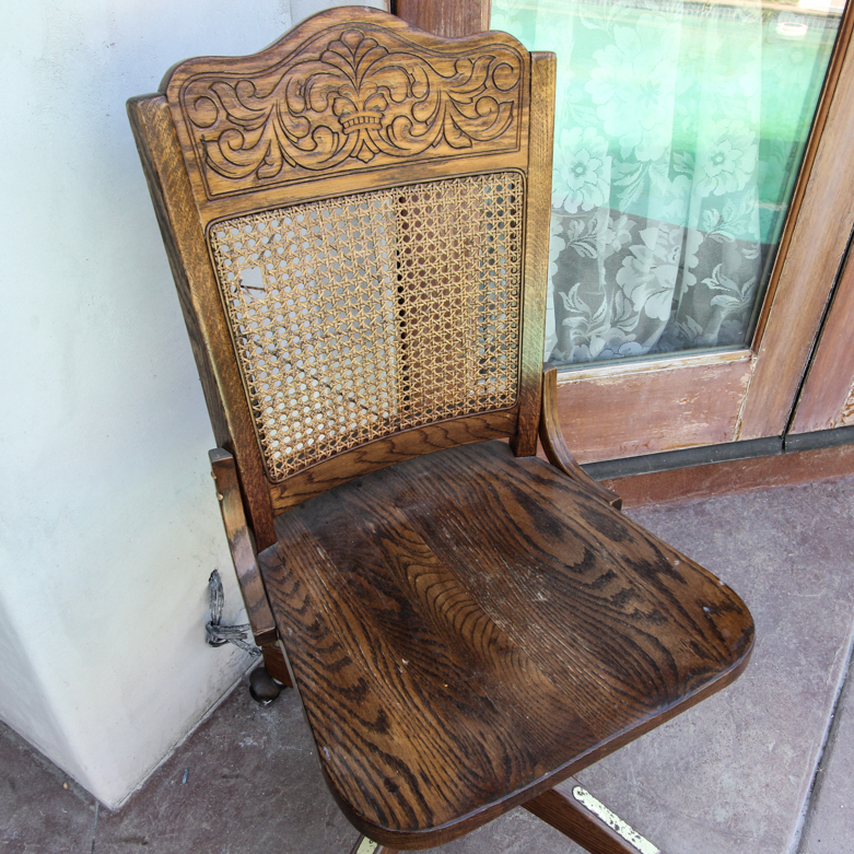 Vintage Rolling Chair with Cane Back