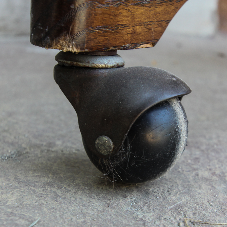 Vintage Rolling Chair with Cane Back