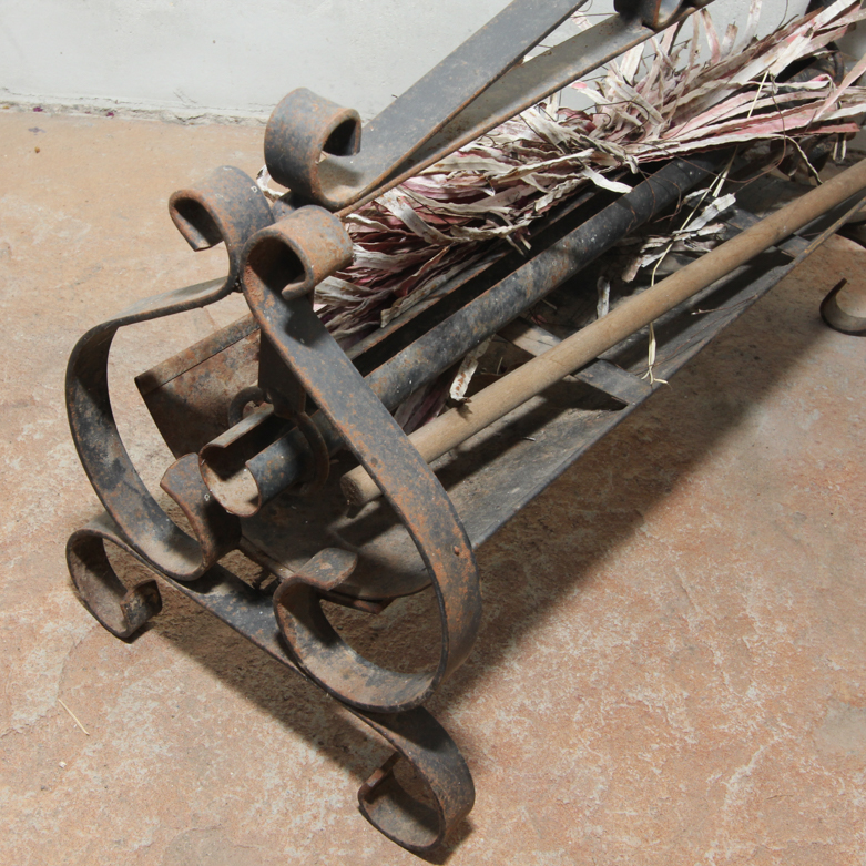 Cast Iron Newspaper Log Roller