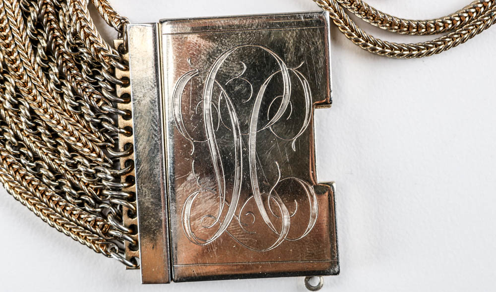 Assortment of Gold Toned Statement Necklaces and Faux Pearls