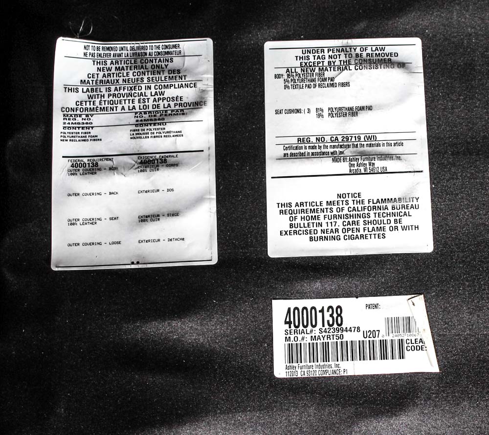 Ashley Furniture Brown Leather Upholstered Sofa