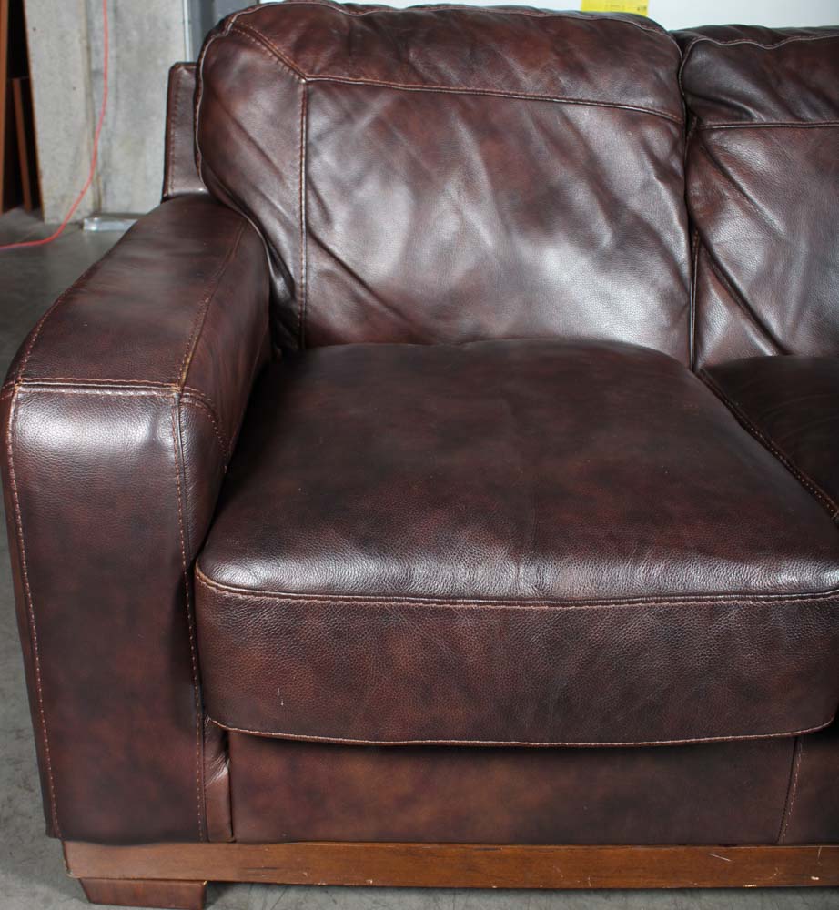 Ashley Furniture Brown Leather Upholstered Sofa