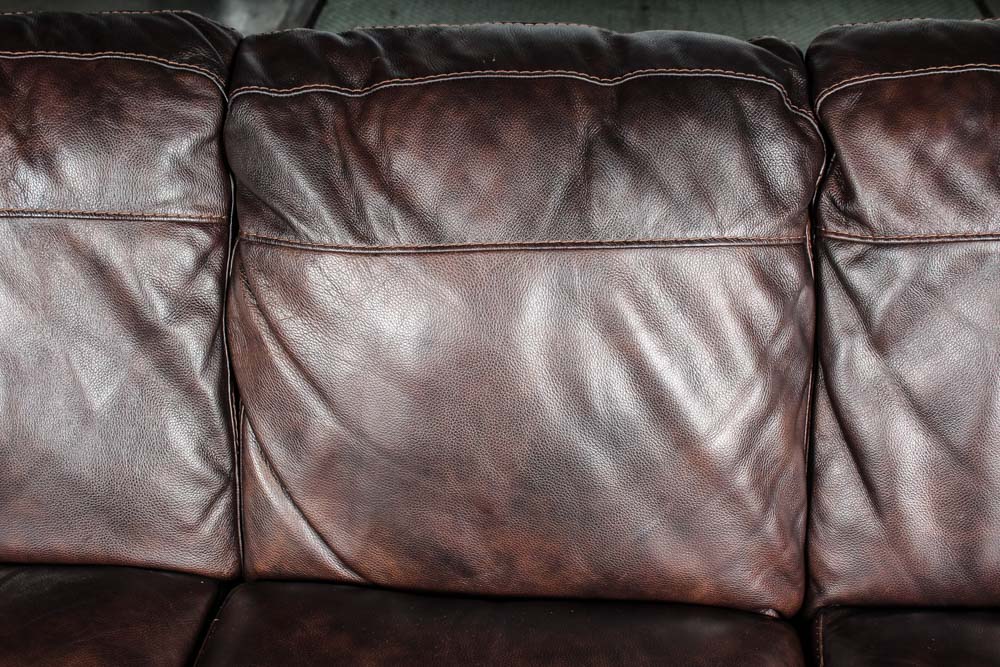 Ashley Furniture Brown Leather Upholstered Sofa