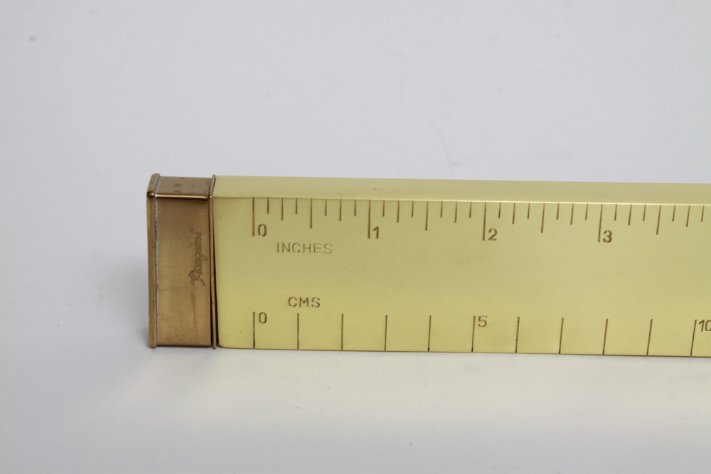 Penguins Lighter in the Shape of a Ruler