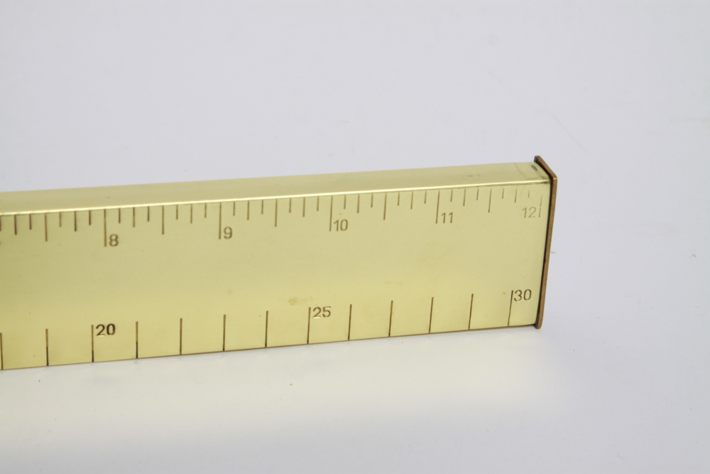 Penguins Lighter in the Shape of a Ruler