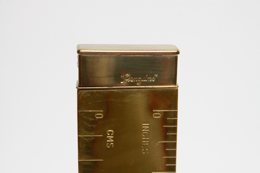 Penguins Lighter in the Shape of a Ruler