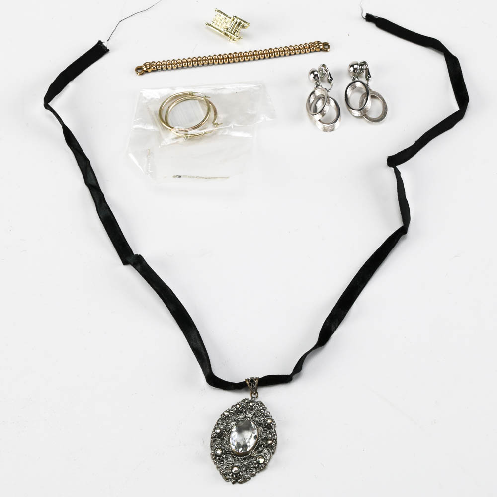 Assortment of Silver and Gold Tone Jewelry