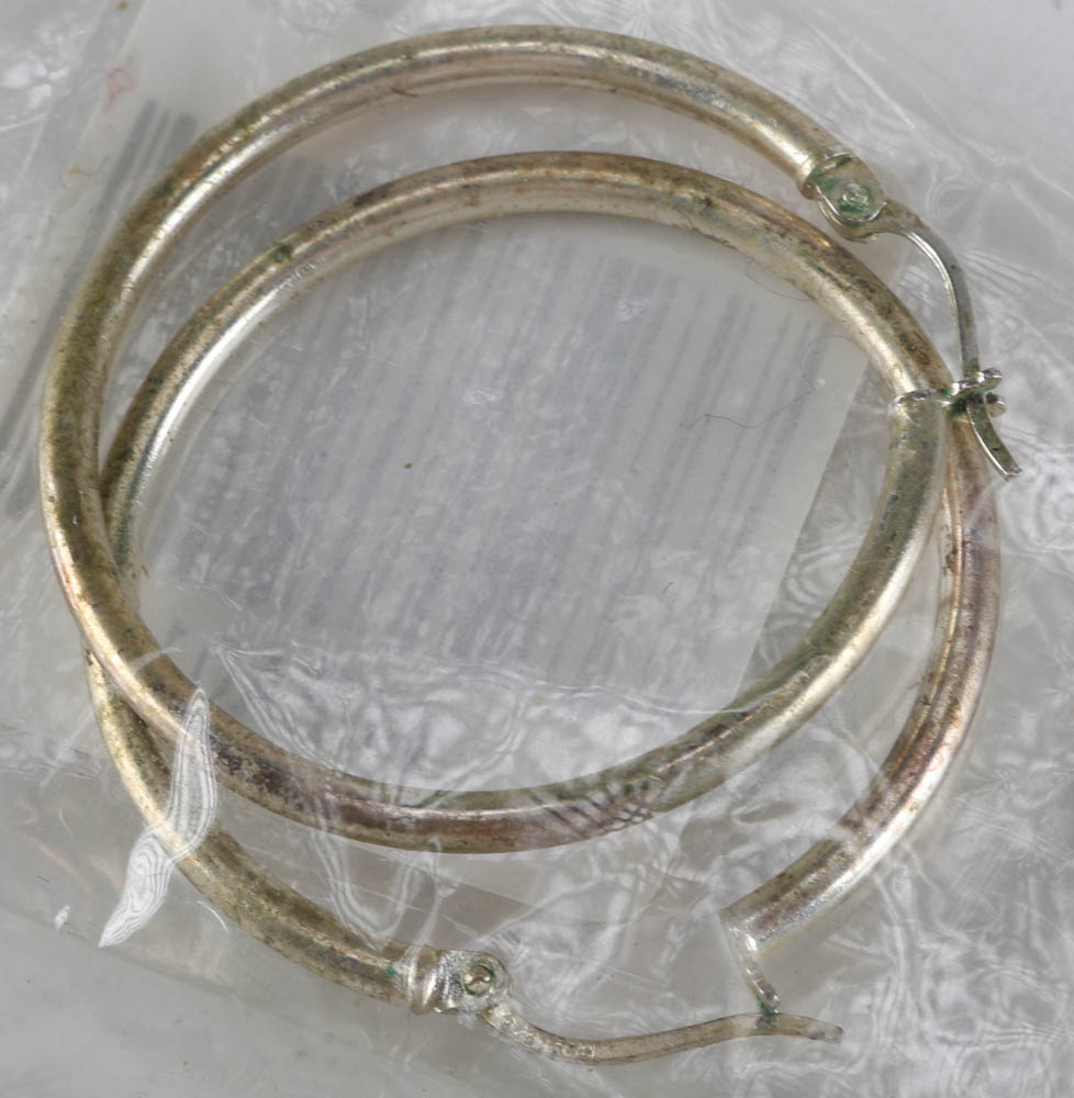 Assortment of Silver and Gold Tone Jewelry