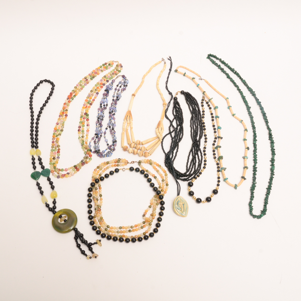 Collection of Carved Stone and Glass Bead Necklaces