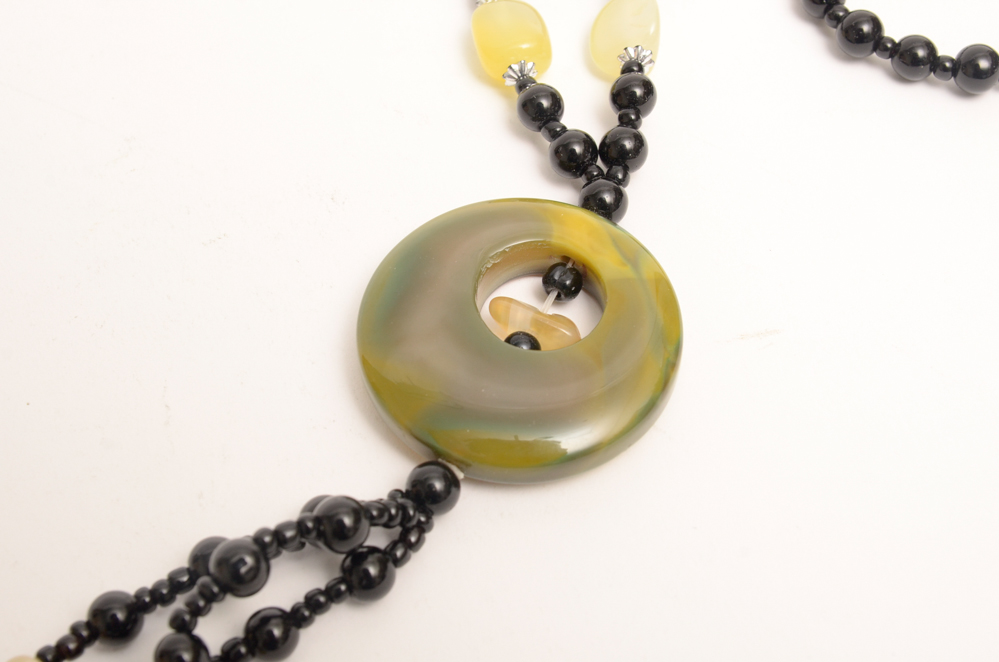 Collection of Carved Stone and Glass Bead Necklaces