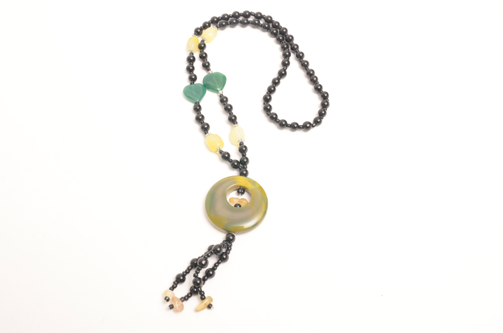 Collection of Carved Stone and Glass Bead Necklaces