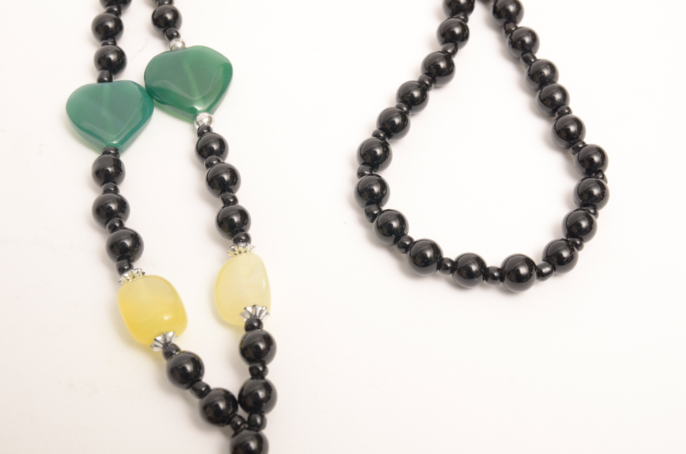 Collection of Carved Stone and Glass Bead Necklaces