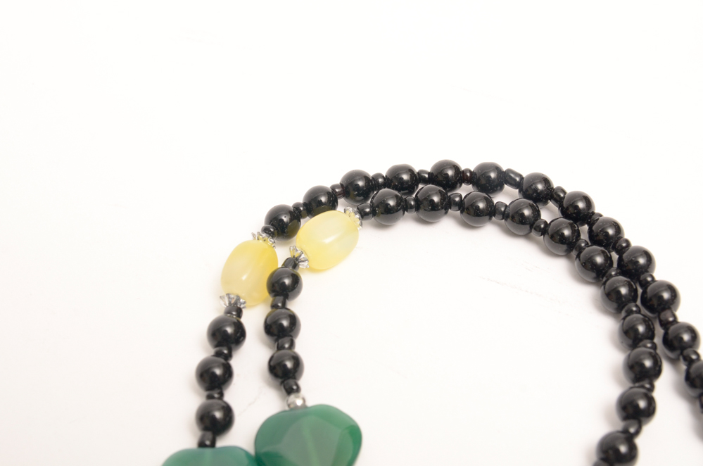 Collection of Carved Stone and Glass Bead Necklaces