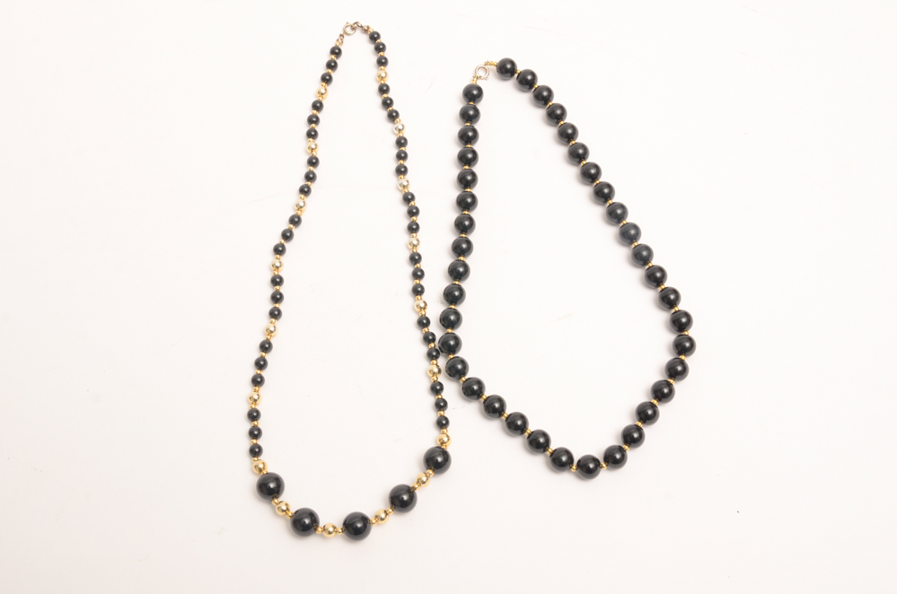 Collection of Carved Stone and Glass Bead Necklaces