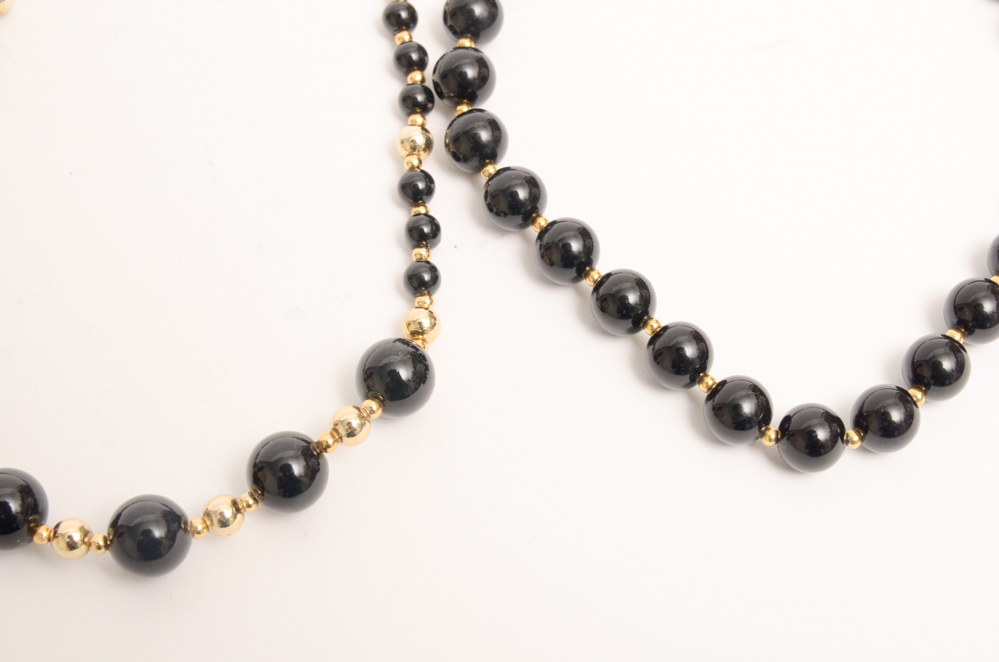 Collection of Carved Stone and Glass Bead Necklaces