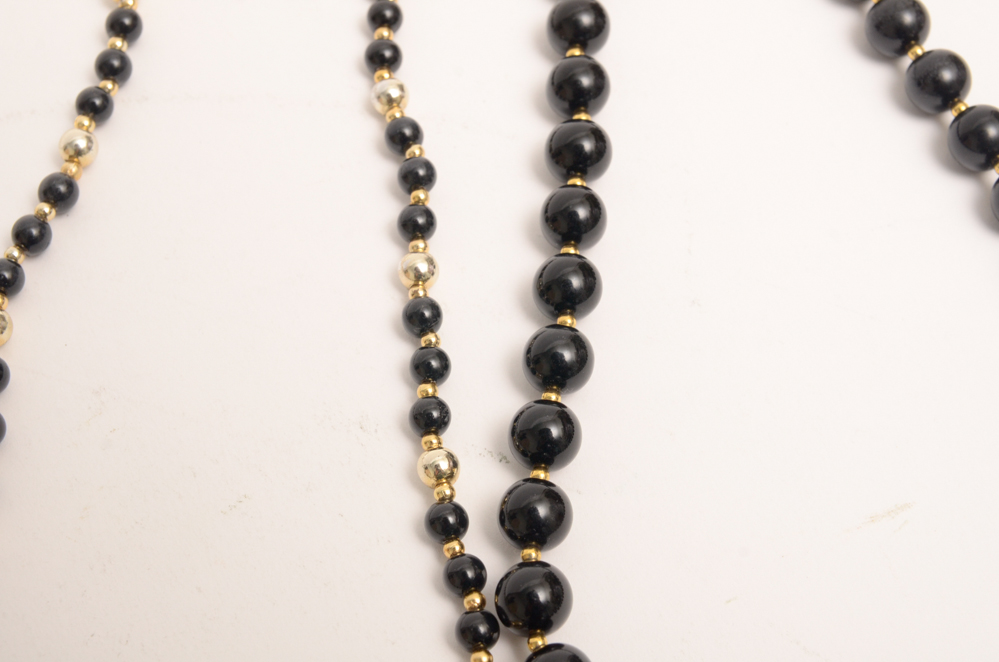 Collection of Carved Stone and Glass Bead Necklaces