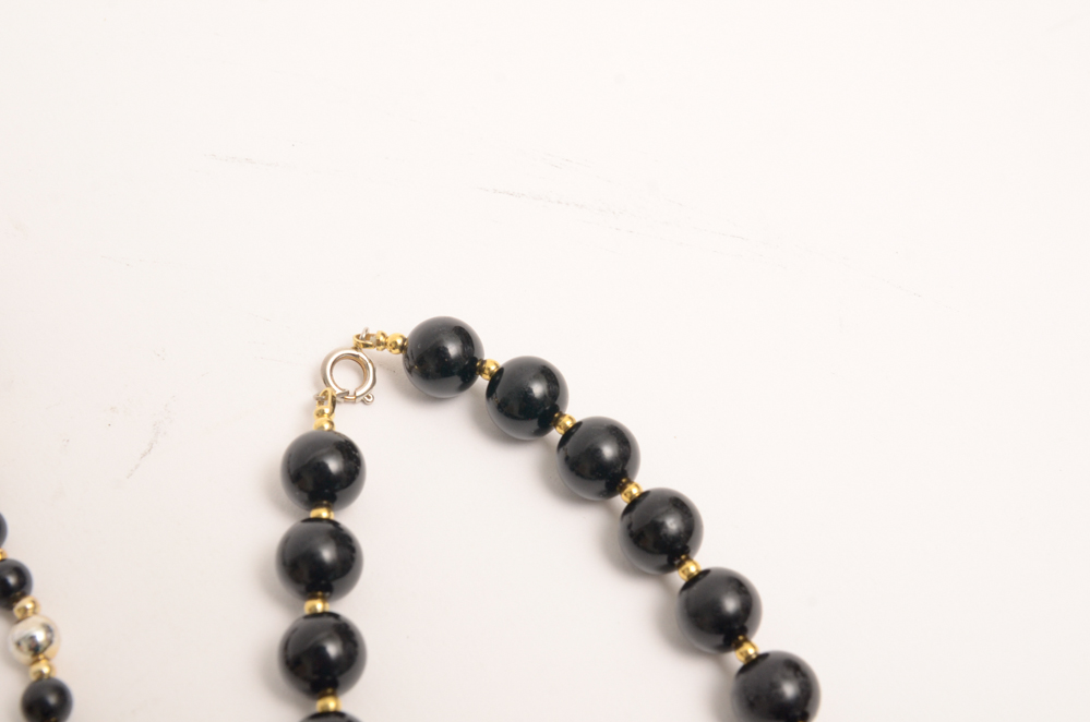 Collection of Carved Stone and Glass Bead Necklaces