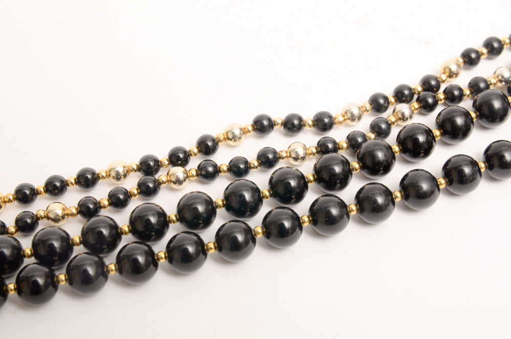 Collection of Carved Stone and Glass Bead Necklaces